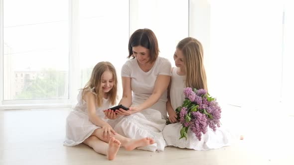 Mother with Daughters in Studio