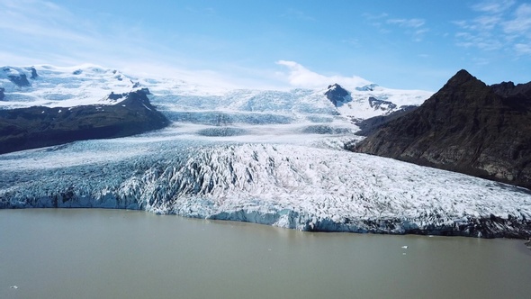 Iceland. Icebergs in a glacial lake. Aerial drone flight over Glacier Lagoon.