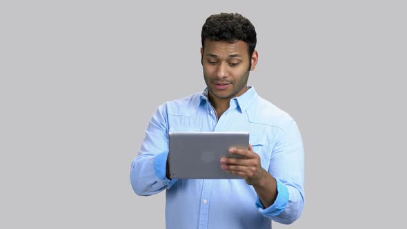 Young Guy Accepts Online Call and Greeting