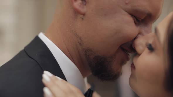 Newlyweds Portrait Caucasian Groom Bride Walking Embracing Hugs Near Old Castle Wedding Couple