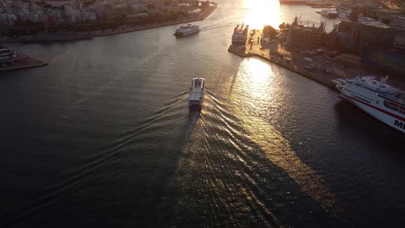 Drone View of the Boats Sailing at the Entrance to the Port at Sunset in Athens