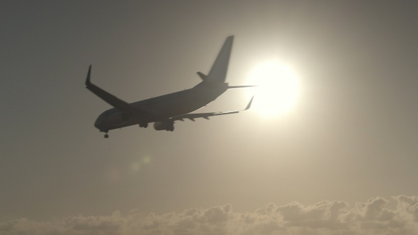 Plane flight against the sunlight