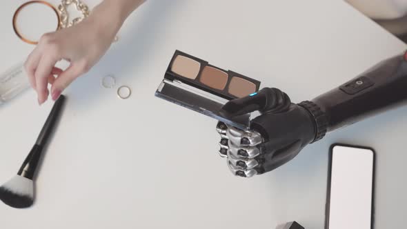 Female with Bionic Arm Doing Makeup