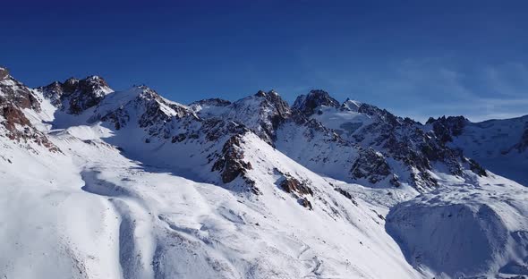 Snow Mountain Peaks with Rocks