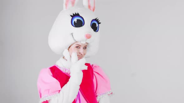 Portrait of a young cute girl in a beautiful hare costume