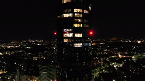 Aerial view of skyscarper Sky Tower in Wroclaw at night. Wroclaw, Poland. Close-up on the building.