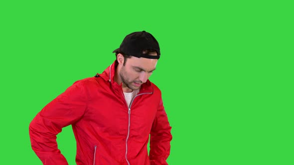 Sportsman Walking and Having a Heart Pain on a Green Screen Chroma Key