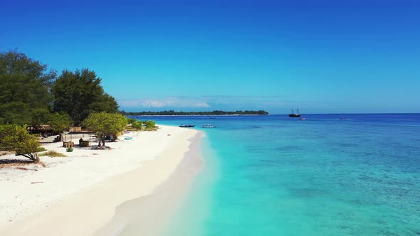 Natural drone abstract view of a sunshine white sandy paradise beach and turquoise sea background in