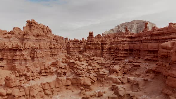 Low aerial shot of hoodoos in Utah's Goblin Valley.