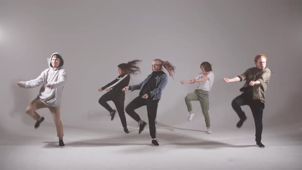 Group of Young Hip-hop Dancers Performing on the Stage