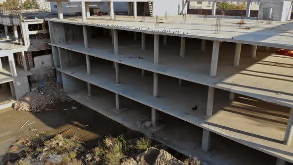 Building that is being built, concrete and sticking fittings at Commercial Construction Site