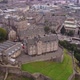 Drone View of Edinburgh Castle and Surrounding Edinburgh in the Background - VideoHive Item for Sale