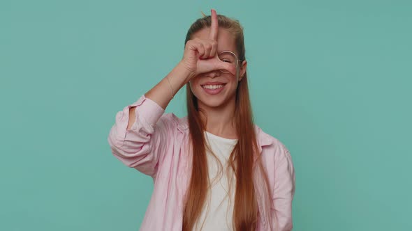 Teenager Girl Showing Loser Gesture Blaming Accusing for Unsuccess Disrespect  Bullying Abuse