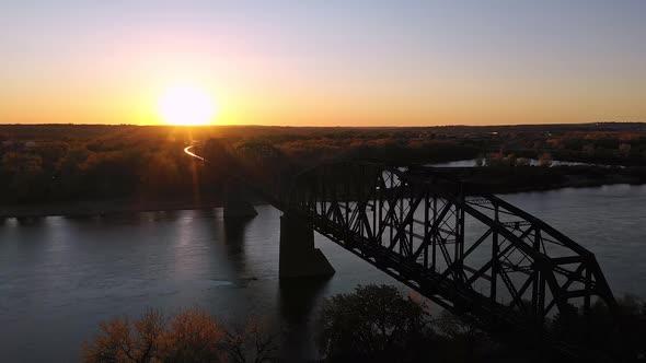 Aerial view of the BNSF Railway Bridge over the Missouri river at sunset