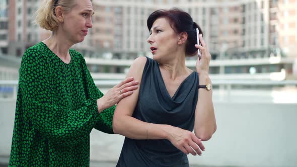 Worried Anxious Woman Talking on Phone Waiting for Friend Being Late for Meeting