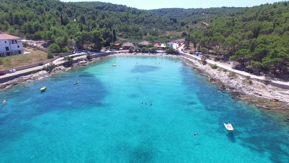 Flying over a breathtaking sandy beach on the island of Brac, Croatia