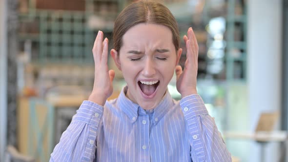 Portrait of Young Businesswoman Shouting, Screaming