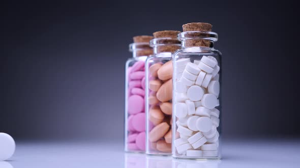 Colorful Pills in Bottles