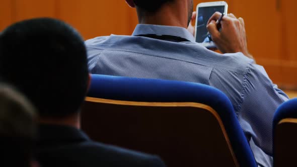 Business executives participating in a business meeting using digital tablet