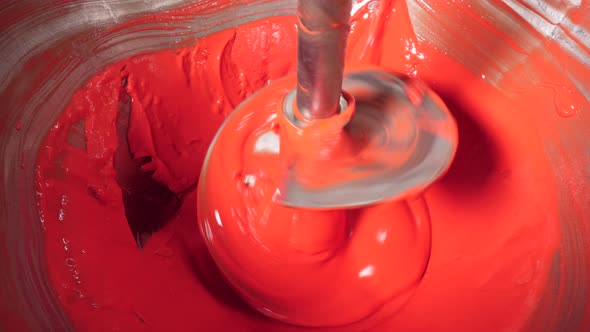 Boring Tool Is Mingling Red Alimentary Paste