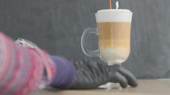 Barista Makes Coffee on a Coffee Machine