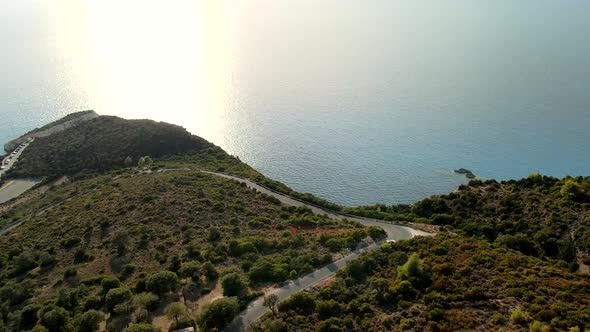 Suv Car Travel at Greece Island Road in Mountains