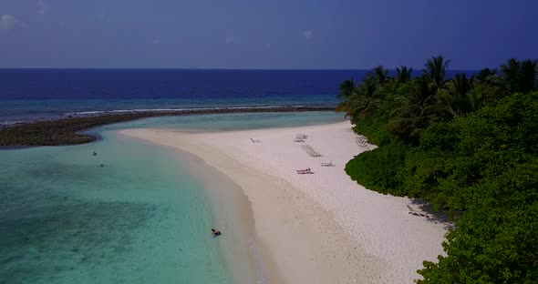 Luxury overhead island view of a summer white paradise sand beach and blue ocean background