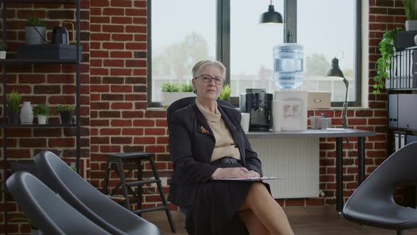 Portrait of Psychologist Preparing for Aa Meeting Therapy Session with People in Circle