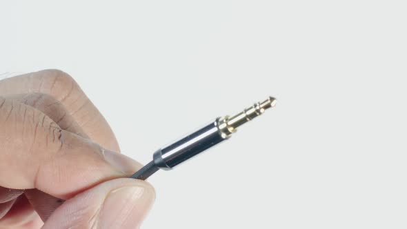 Auxillary Headphone Cable In Hand