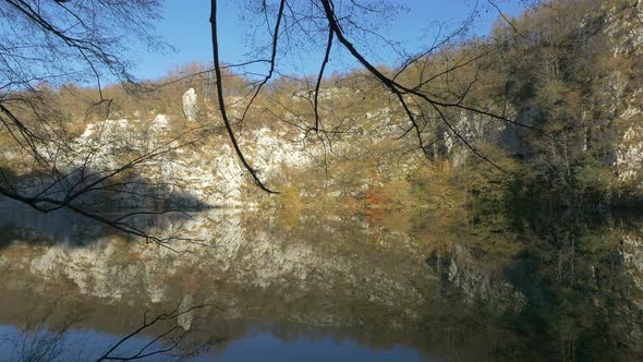 Pan left of an autumn landscape at Plitvice Park