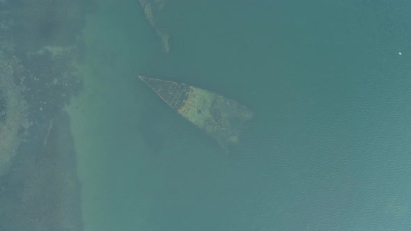 Aerial View of Wreckage Submerged Warships Abandoned Vessels