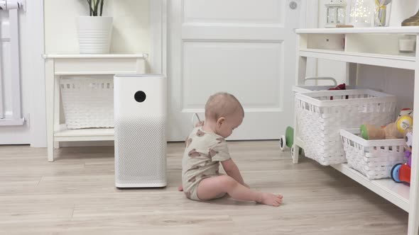 Toddler Pulls the Electric Plug Out of Socket 1 Year Old Infant Playing with Electric Wire on Floor