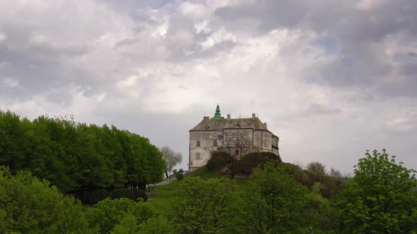 Aerial View of Olesky Castle and the Surrounding Landscape in Spring, Ukraine