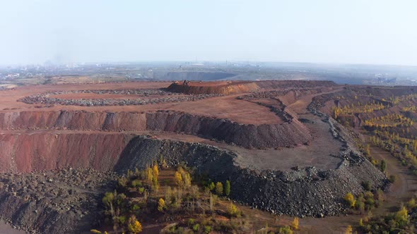 Huge Mounds of Waste Iron Ore Near the Quarry