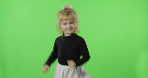 Girl in Black and White Dress Dancing. Happy Four Years Old Child. Chroma Key