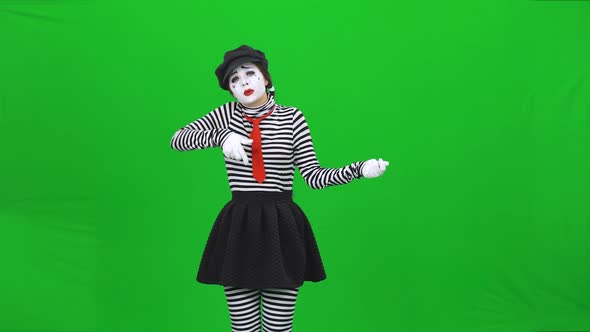 Mime Girl Is Playing Guitar, Begging an Alms