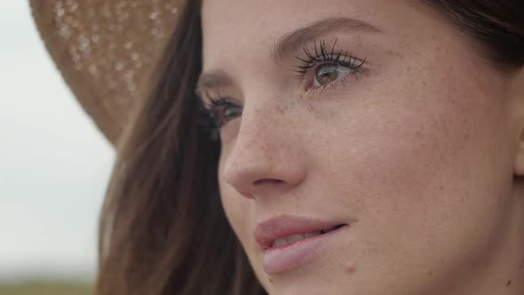 Close up of Pretty face Ginger lady with Beautiful Eyes and Long Eyeslashes.