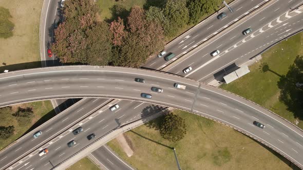 Aerial close up of a highway intersection with traffic at day time in Buenos Aires