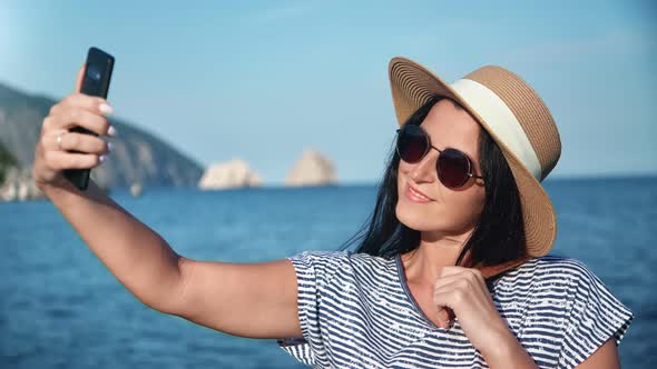 Joyful Young Woman Posing Taking Selfie Use Smartphone at Seaside