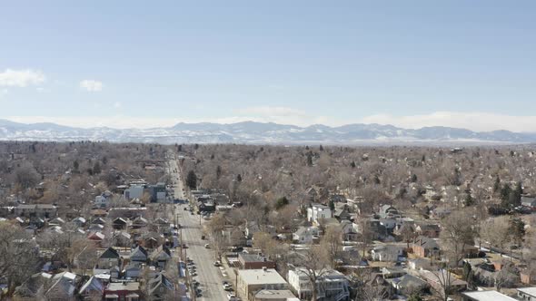 Denver Co Aerial Rising Up Shot Street Heading Toward Rocky Mountains