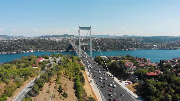 Aerial view of Fatih Sultan Mehmet Bridge and car traffic