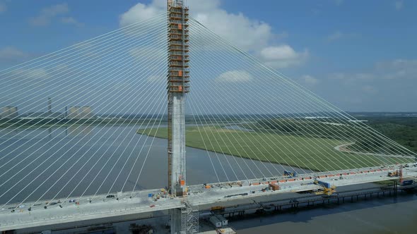 Rising Aerial View of a Cable Stayed Bridge in the Late Construction Phase