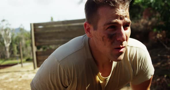 Military soldier standing at boot camp