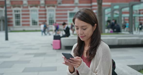 Woman use of mobile phone in Tokyo city