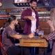Guy Meet His Friends In A Bar To Celebrate And Ask For A Drink - VideoHive Item for Sale