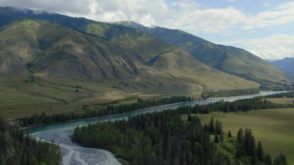 Blue Katun river in the middle of mountains of Ak-Kem valley in Altai