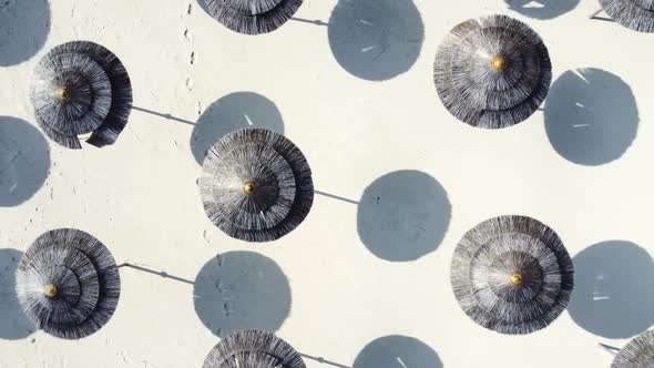 Aerial View of Umbrellas at Sandy Beach Sunny Weather