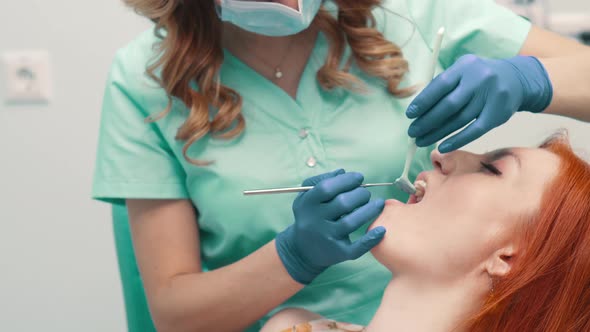 Young Woman at Reception with Dentist