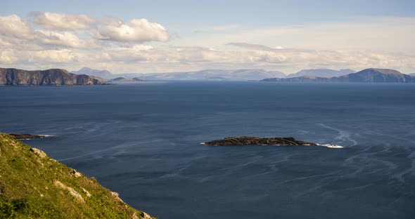 Time Lapse of ocean cliffs in the distance on sunny summer day in Achill Island on Wild Atlantic Way