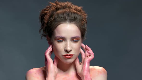 Cheerful Woman Wearing Artistic Makeup